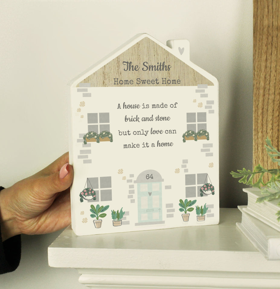 Personalised Love Makes A Home Wooden House Ornament