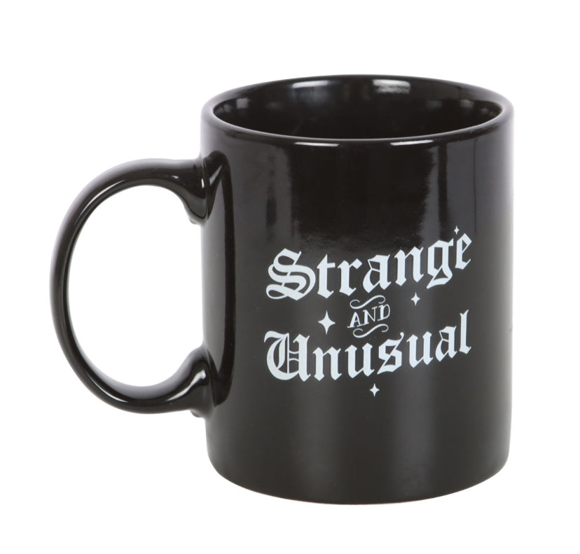 Strange and Unusual Mug