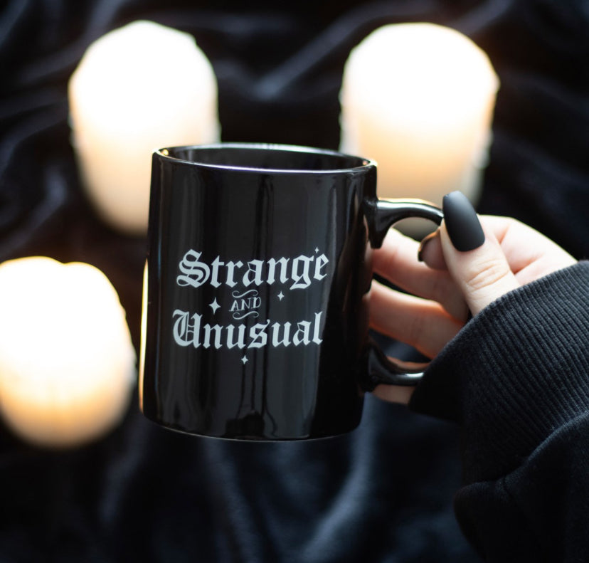 Strange and Unusual Mug